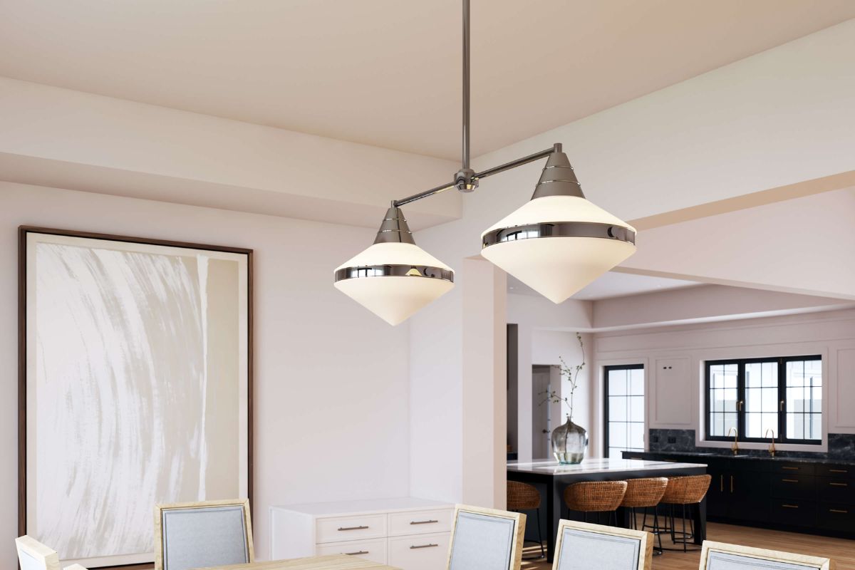 Dining room with modern overhead lights showing a space free of common lighting design mistakes.