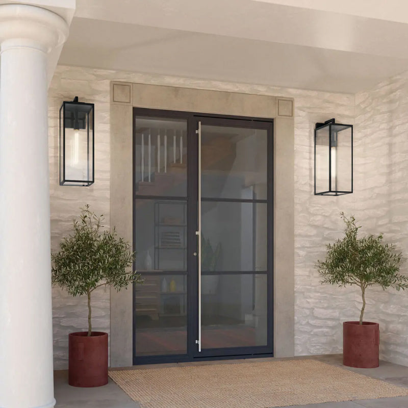 Outdoor Wall Light black outdoor wall lights mounted beside a modern front entrance.
