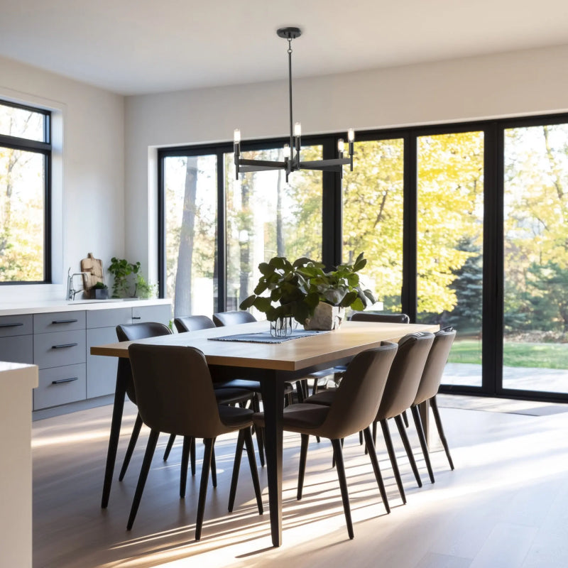 DVI Lighting black chandelier with candle-style lights above a bright contemporary dining table.