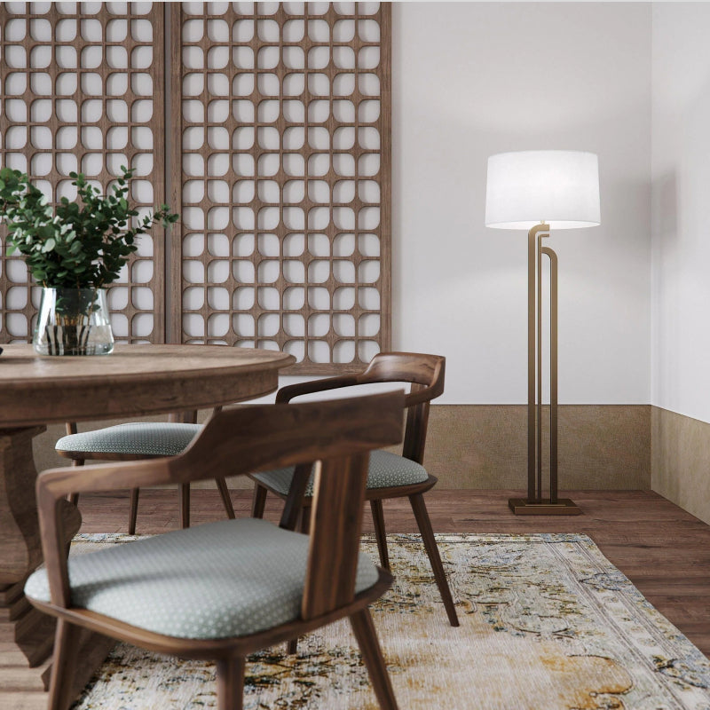 Club Floor Lamps brass club floor lamp with white fabric shade in a warm dining room corner.