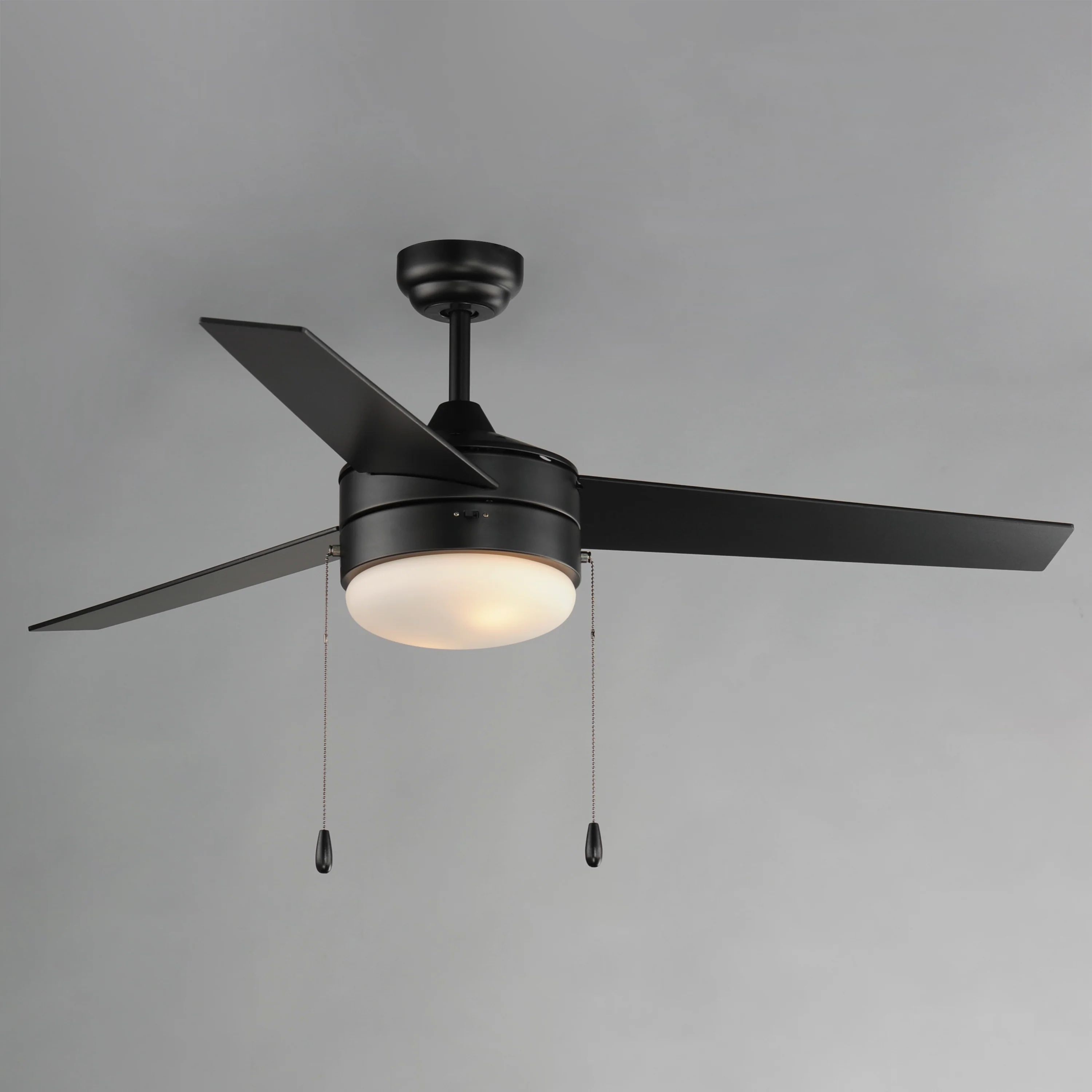 Black Ceiling Fans black ceiling fan with integrated light and pull chains against a white ceiling.