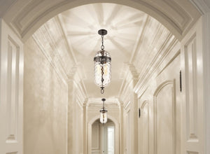 Hallway lighting with elegant hanging lanterns casting intricate shadows, creating a luxurious and inviting corridor.