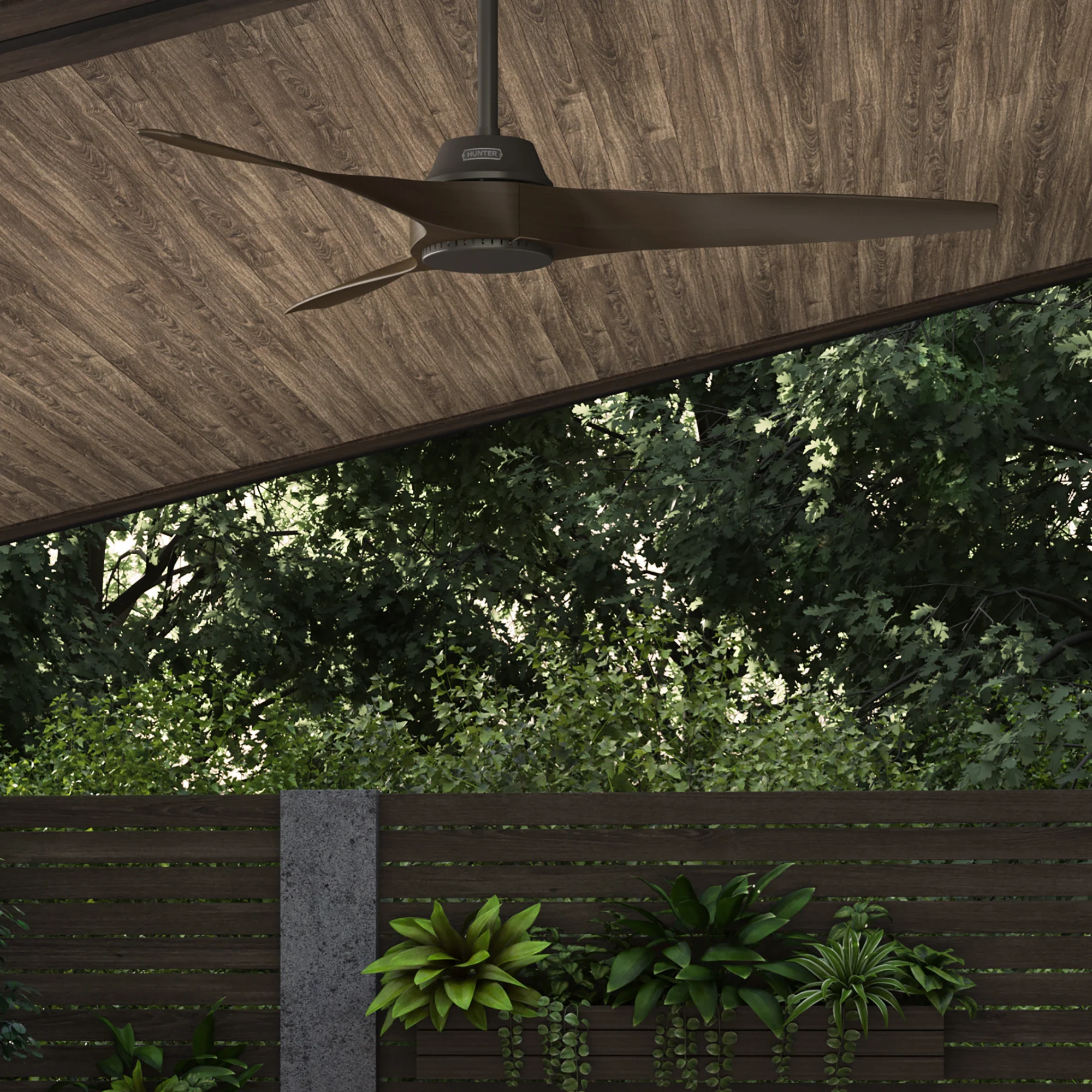Outdoor Ceiling Fans dark Hunter ceiling fan mounted under a covered outdoor patio with wood ceiling.