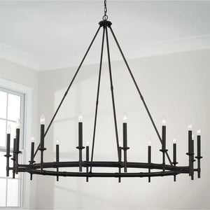 Large black chandelier with multiple candle-style lights hanging in a modern space, available at Lights Canada.