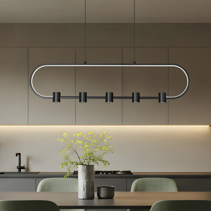 Linear Pendants black linear pendant with scalloped shades above a warm marble kitchen.