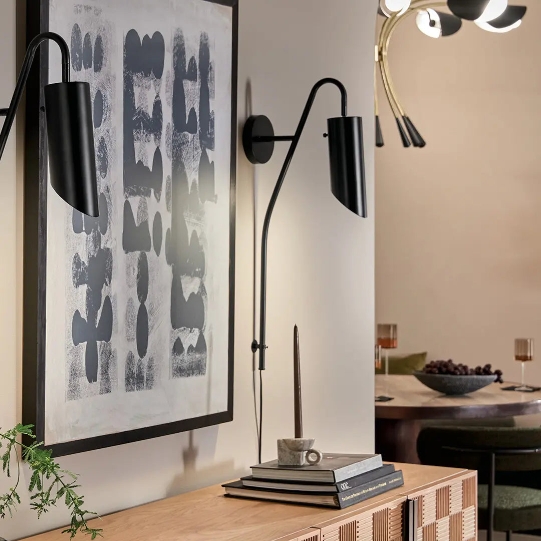 Contemporary Sconces black contemporary wall sconces above a modern console table.