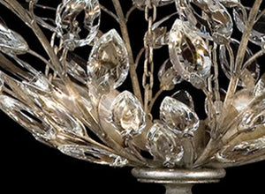 Intricate crystal lighting fixture showcasing a floral design with sparkling glass crystals, perfect for adding elegance to any space.