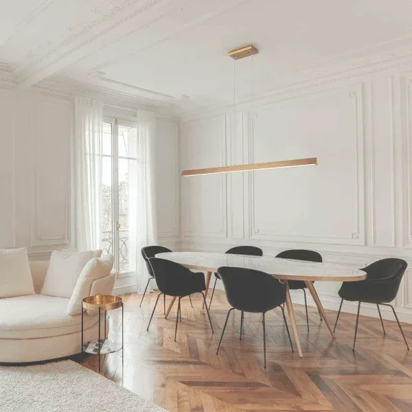 Elegant dining room featuring Linear Suspension by Matteo, with minimalist design and warm lighting, perfect for modern interiors.