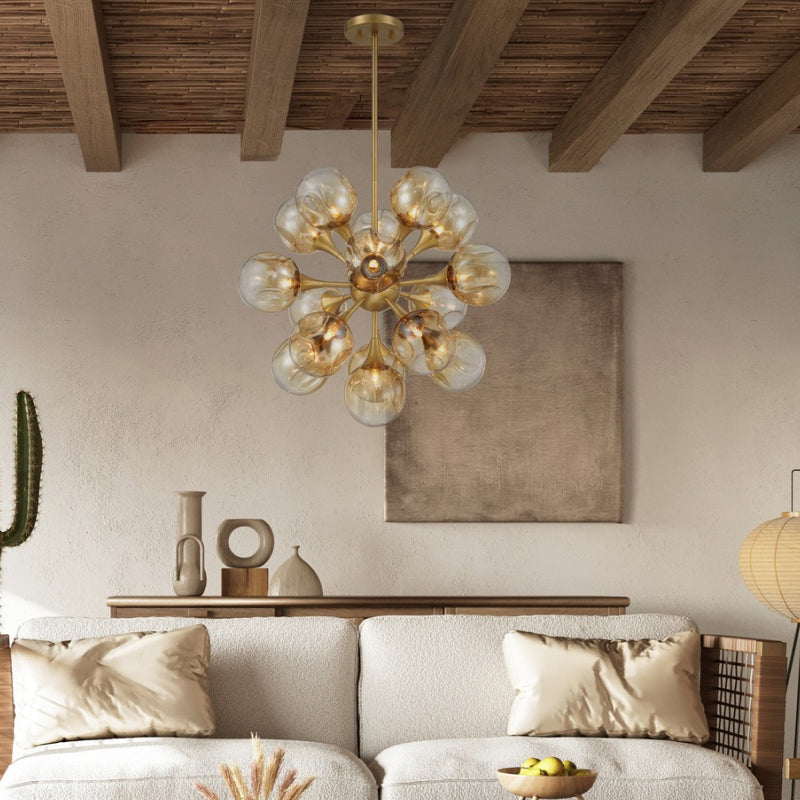 Modern Chandeliers gold chandelier with smoky glass globe shades above a modern living room sofa.