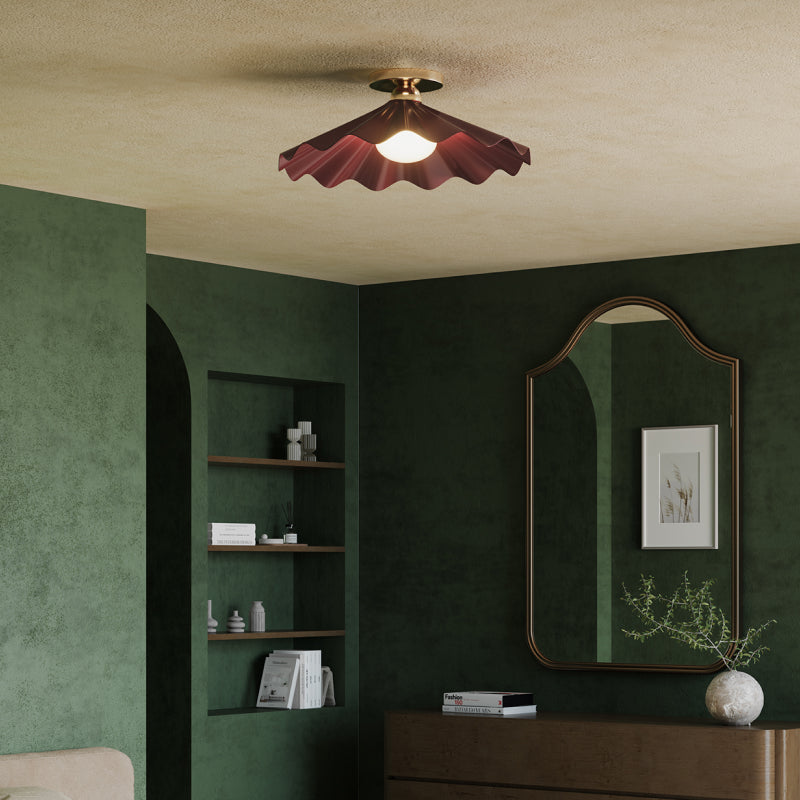 Modern Flush Mount Lights sculptural burgundy flush mount light in a green modern living room.