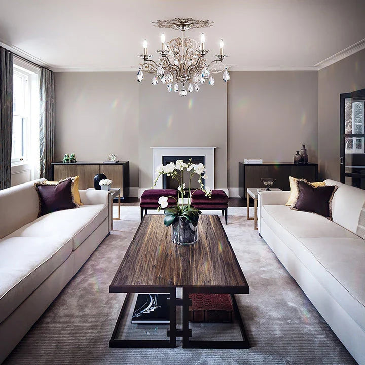 Elegant crystal semi-flush mount chandelier by Schonbek in a luxurious living room at Lights Canada