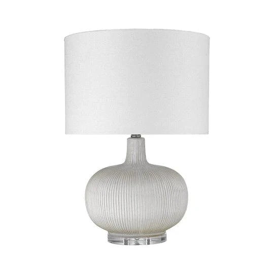 Modern table lamp by Trend with a ribbed ceramic base and fabric shade.