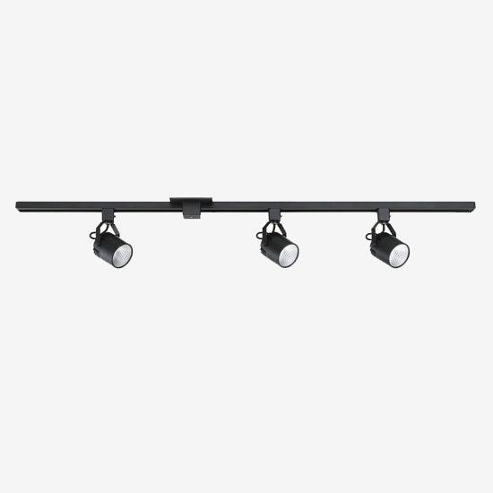 Black track lighting kit with four adjustable spotlight heads mounted on a linear rail.