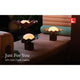 Decorative lamps on a wooden surface with 'Just For You' text and gift card information.