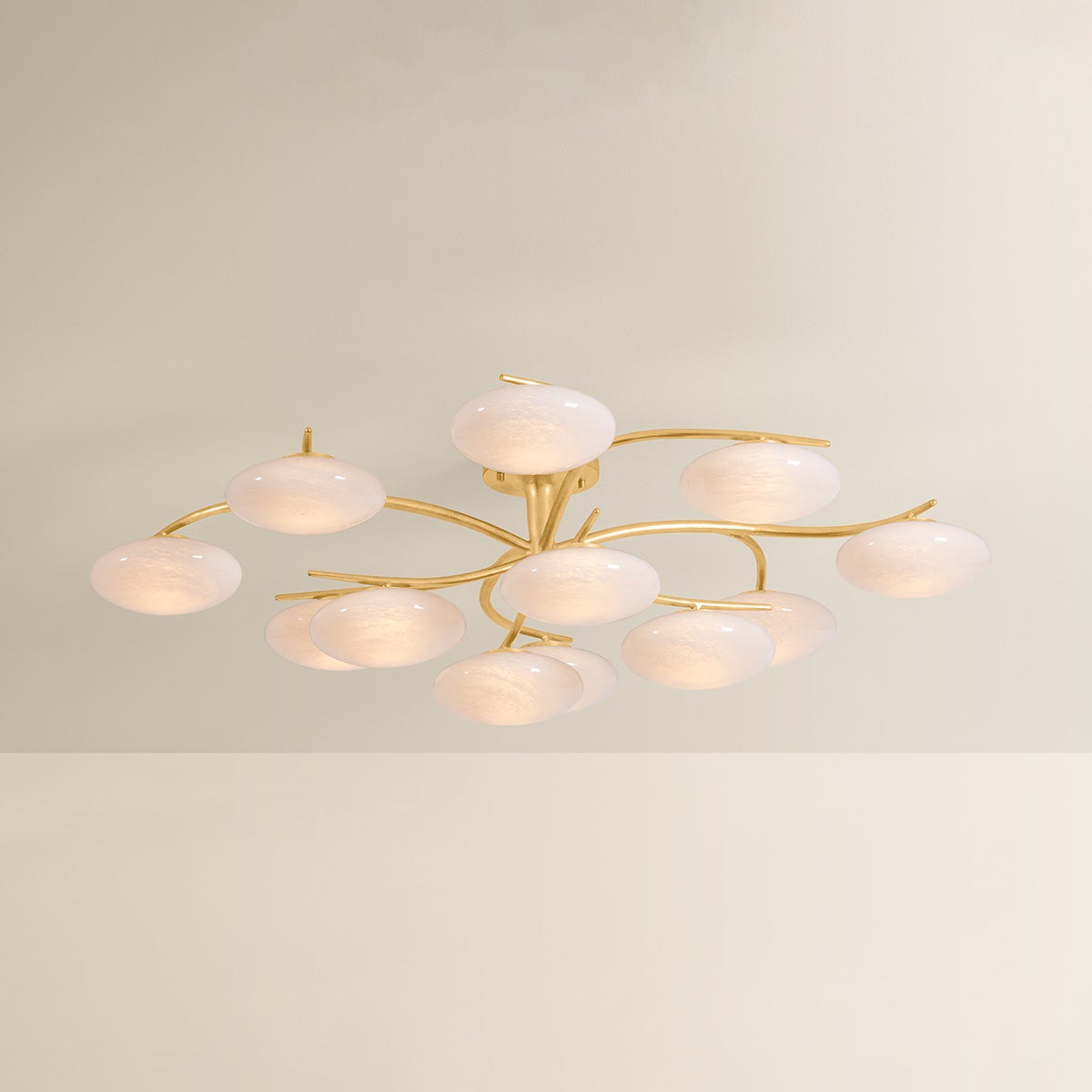 Bayberry multi-arm chandelier with oval white glass globes spreading on gold brass branches, product shot
