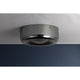 Gunmetal grey round flush mount ceiling light installed on ceiling in styled room