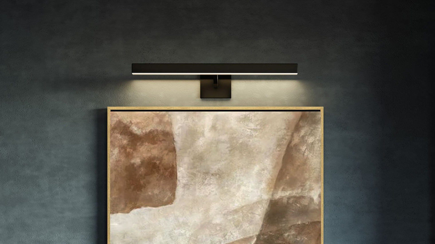 Matte black slim LED picture light bar mounted above framed abstract canvas on dark textured wall