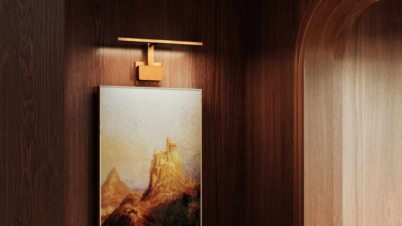 Brushed brass adjustable LED picture light above oil landscape painting on dark wood panelled wall