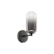 1-light wall sconce in matte black finish with tall oval frosted glass capsule shade on round backplate, product photo