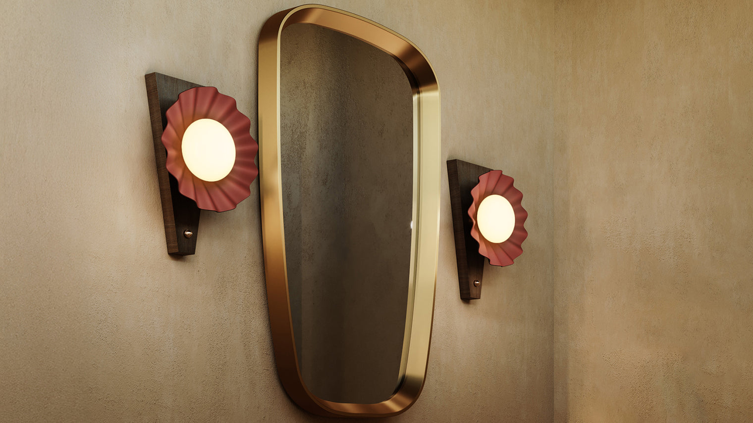 Pair of dark wood and dusty rose ruffled ceramic wall sconces with opal globe bulbs flanking rounded brass-framed mirror on textured plaster wall