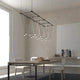 Suspenders 96" x 24" Gridscape with 32" V-Line Etched Cylinder Luminaires
